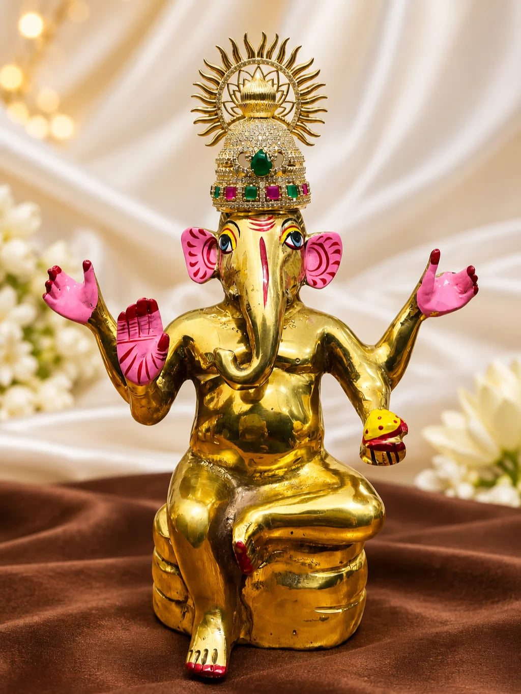 Shop Surya Kalash AD Mukut for Deity with radiant Surya-inspired styling, Kalash-inspired artistry and sparkling AD work for grand divine shringar.
