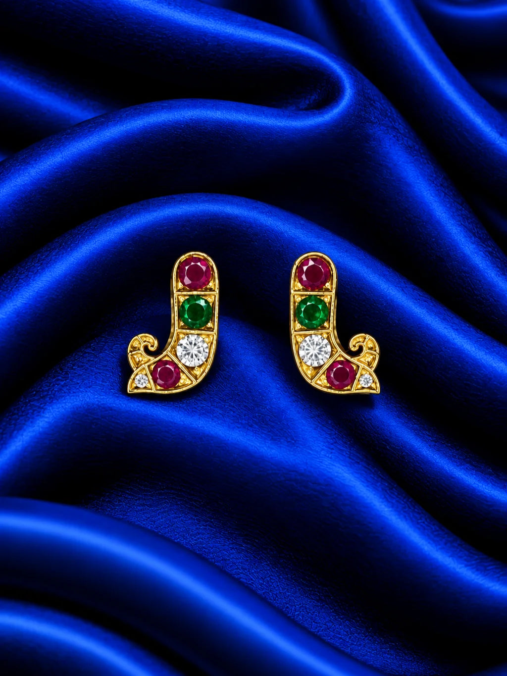 Shop Triratna AD Earrings for Deity with ruby-red, emerald-green and sparkling white stones. Elegant multicolor jewellery for divine festive shringar.

