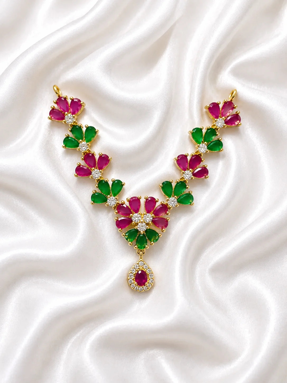 Vrindavan gold plated floral American Diamond garland with ruby and emerald stones for deity shringar