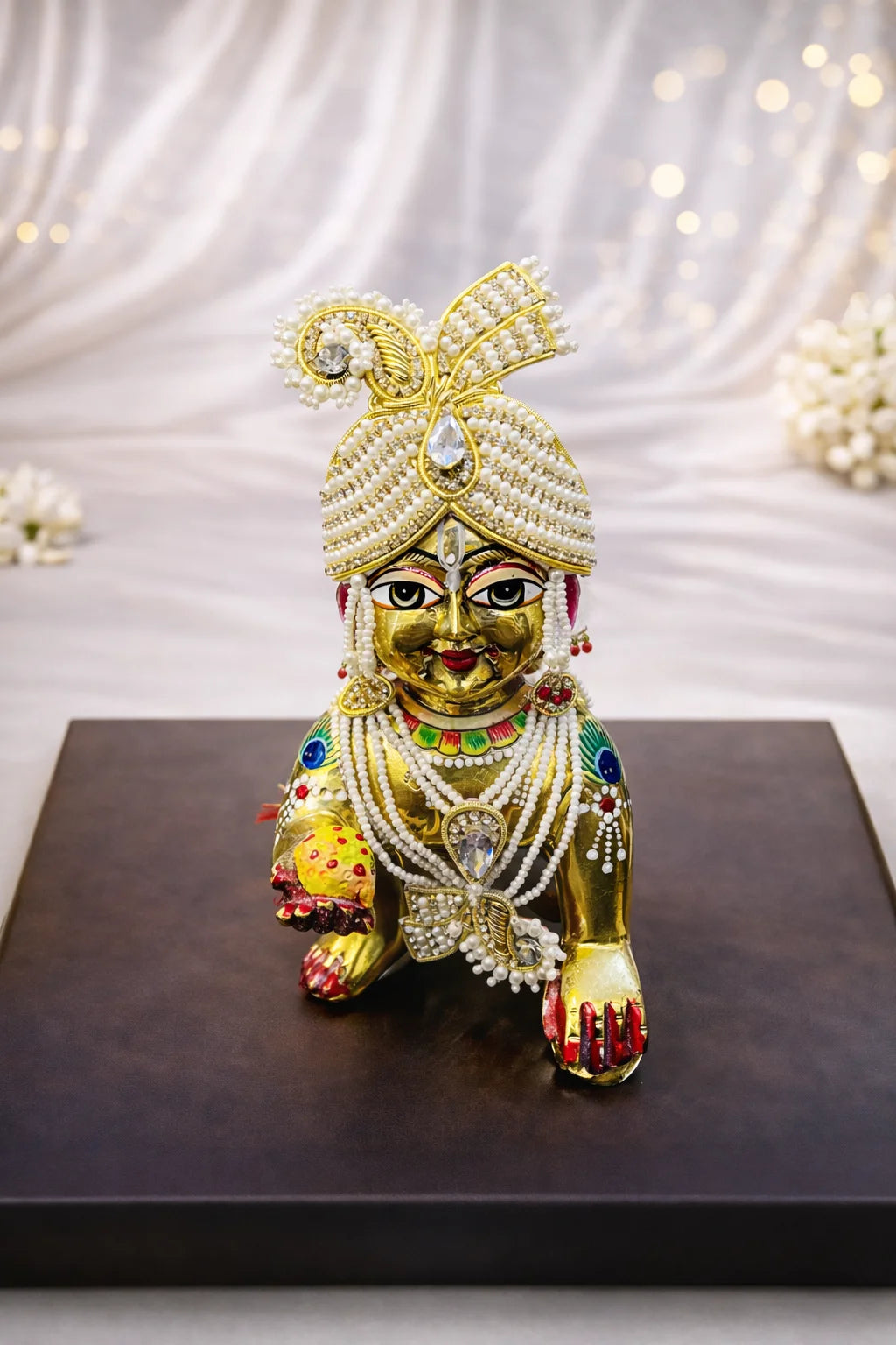 White pearl and gold Laddu Gopal jewellery set with mukut and mala – traditional shringar set for Kanha Ji.