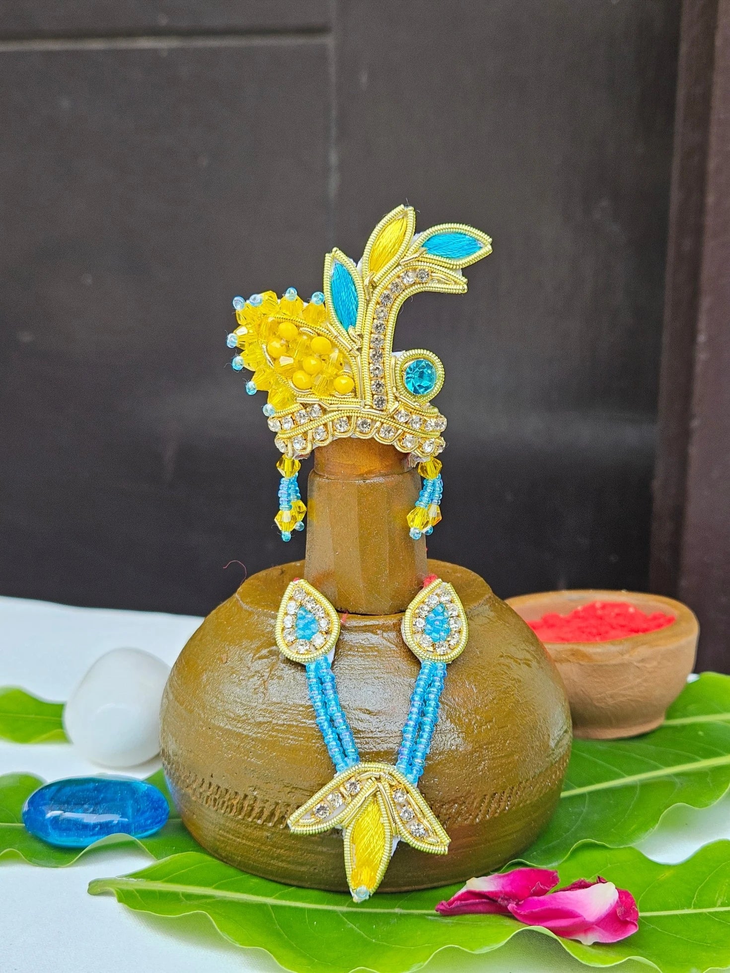 Laddu Gopal yellow and blue mukut with matching mala – handcrafted crown and necklace set for divine shringar.