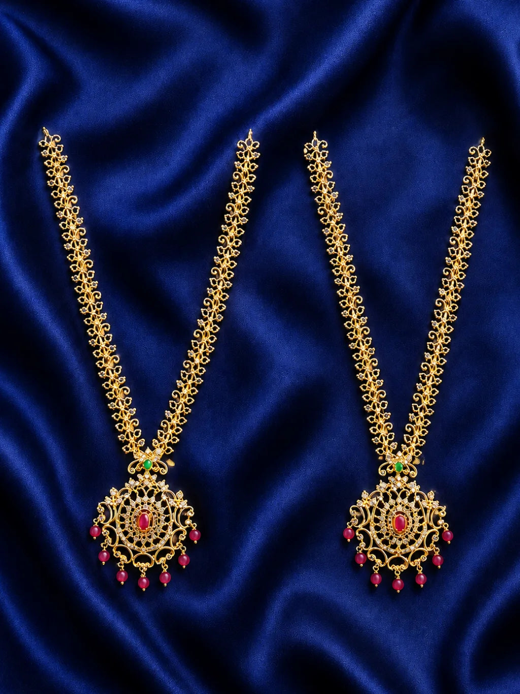 Adorn Radha Krishna with the Yugalini AD Haar set. This matching set of 2 adds a graceful sparkle to Jugal Jodi deity shringar.