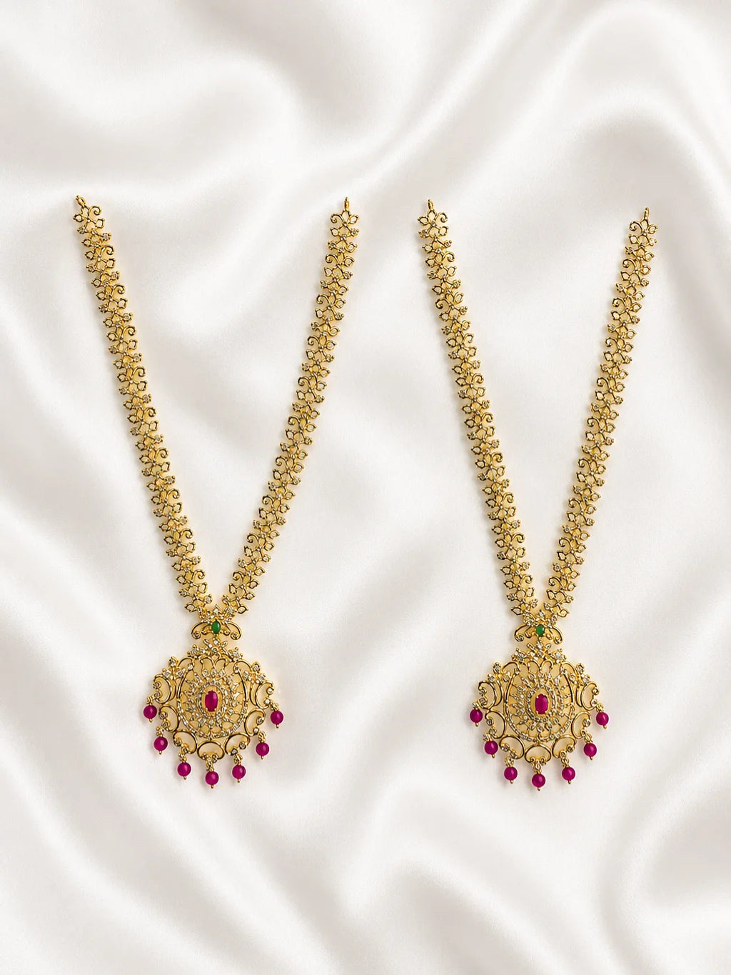 Adorn Radha Krishna with the Yugalini AD Haar set. This matching set of 2 adds a graceful sparkle to Jugal Jodi deity shringar.