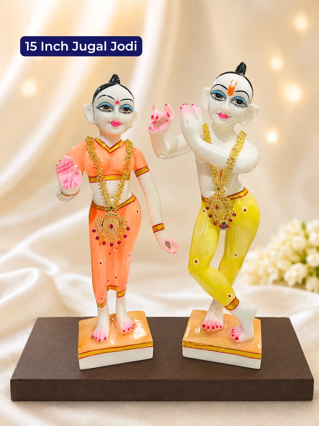 Adorn Radha Krishna with the Yugalini AD Haar set. This matching set of 2 adds a graceful sparkle to Jugal Jodi deity shringar.