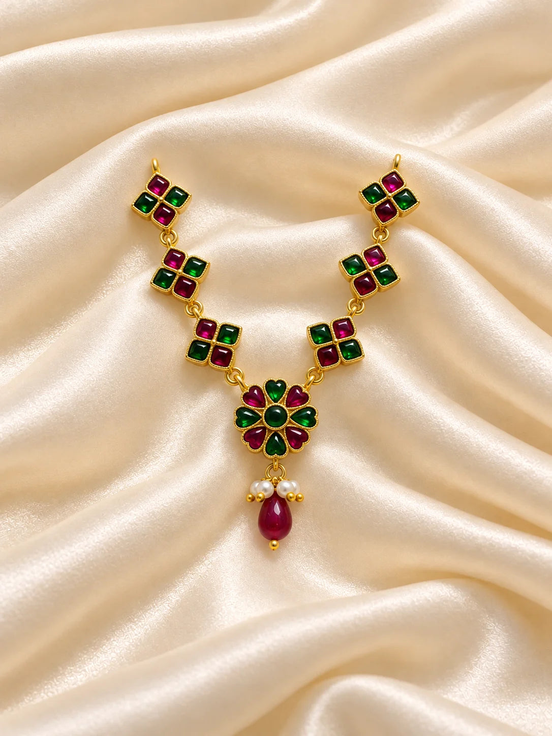 Panna Hridayika Necklace for Deity featuring emerald-green inspired heart design ornamentation for Laddu Gopal, Radha Rani and traditional Krishna Ji shringar.

