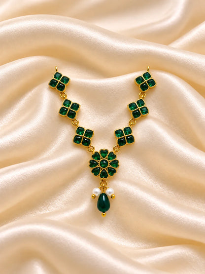 Panna Hridayika Necklace for Deity featuring emerald-green inspired heart design ornamentation for Laddu Gopal, Radha Rani and traditional Krishna Ji shringar.
